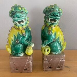 A pair of vintage Chinese Sancai glazed Foo dog figurines.